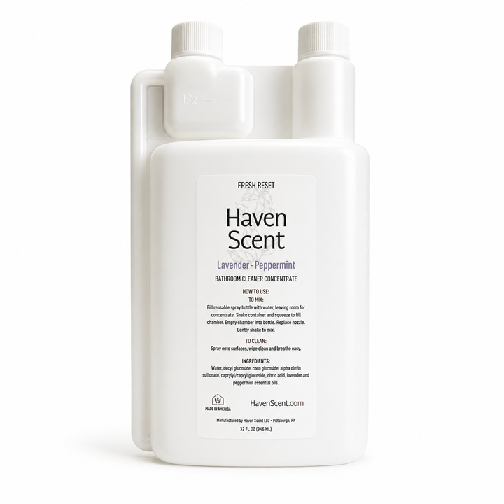 A white plastic bottle of Haven Scent Lavender/Peppermint Bathroom Cleaner Concentrate with a carry handle, shown on a clean white background.